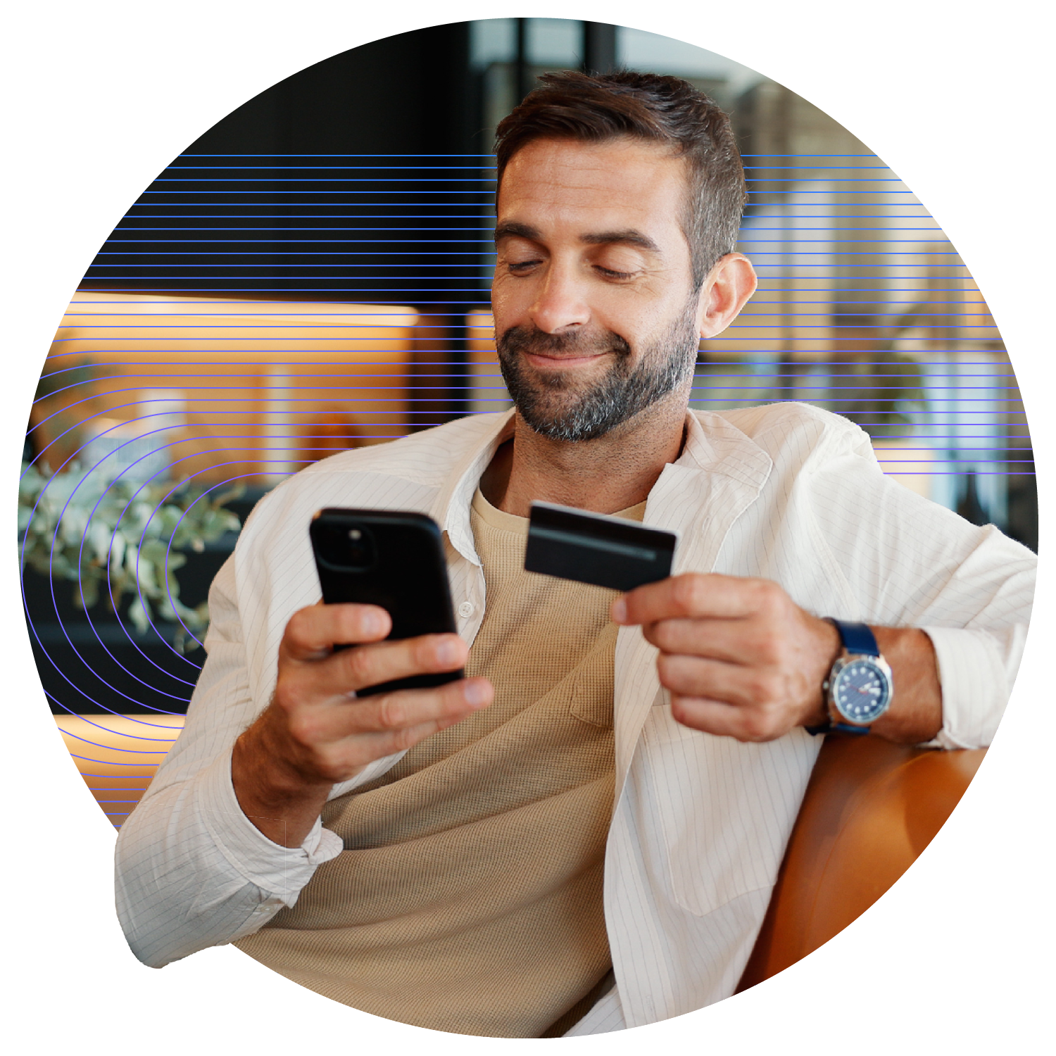 A man paying on his mobile using a card