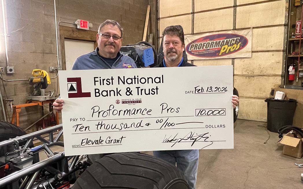 Randy Kleikamp, owner of Proformance Pros, is shown with Wes Stripling of First&nbsp;National Bank & Trust