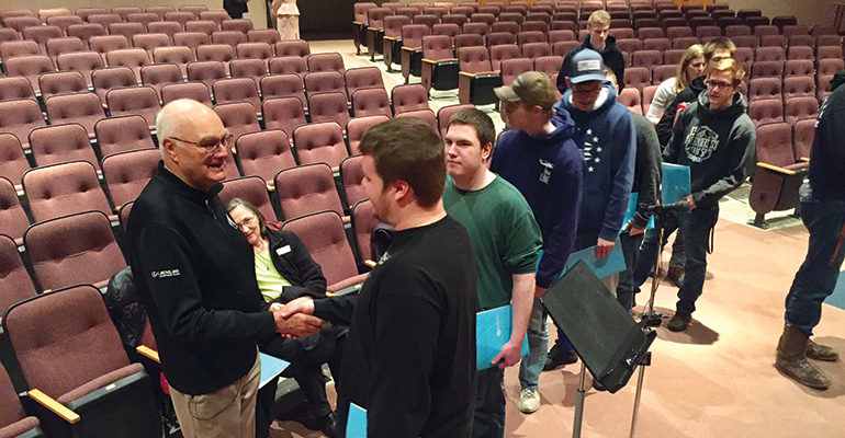 Dennis Frandsen with Rush City High School students