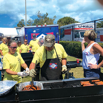 people at a barbeque