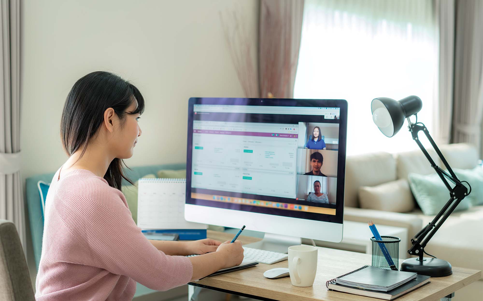 woman sitting at a computer