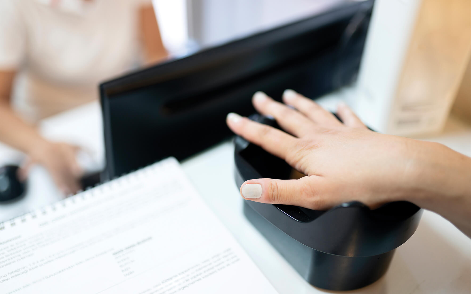 hand using a security device