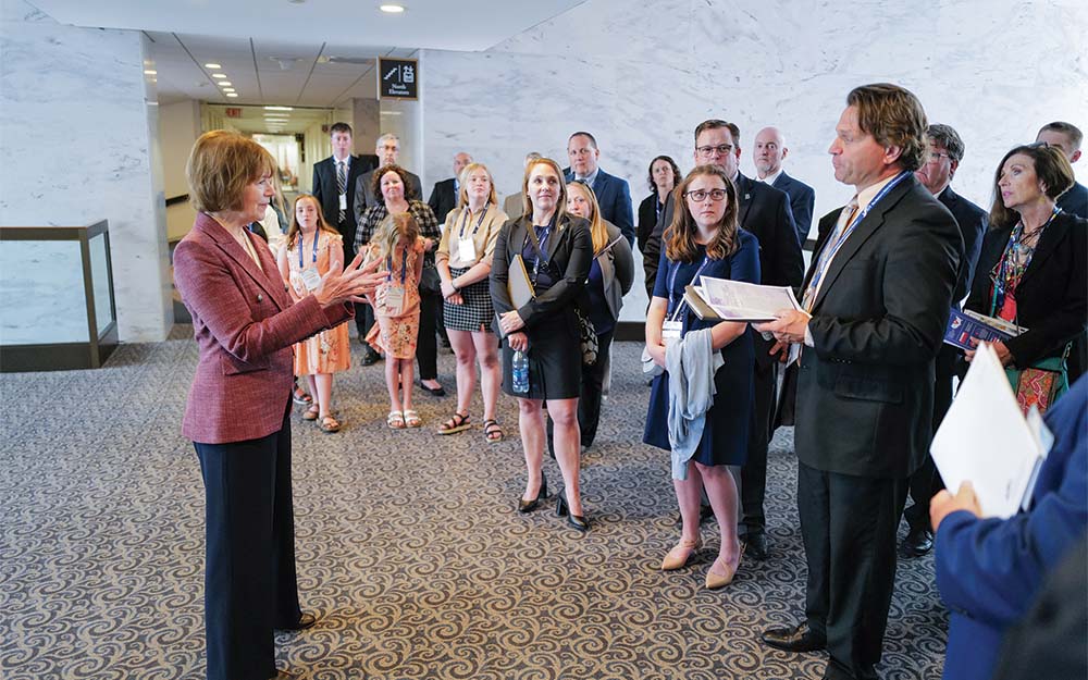 Senator Tina Smith with banker group