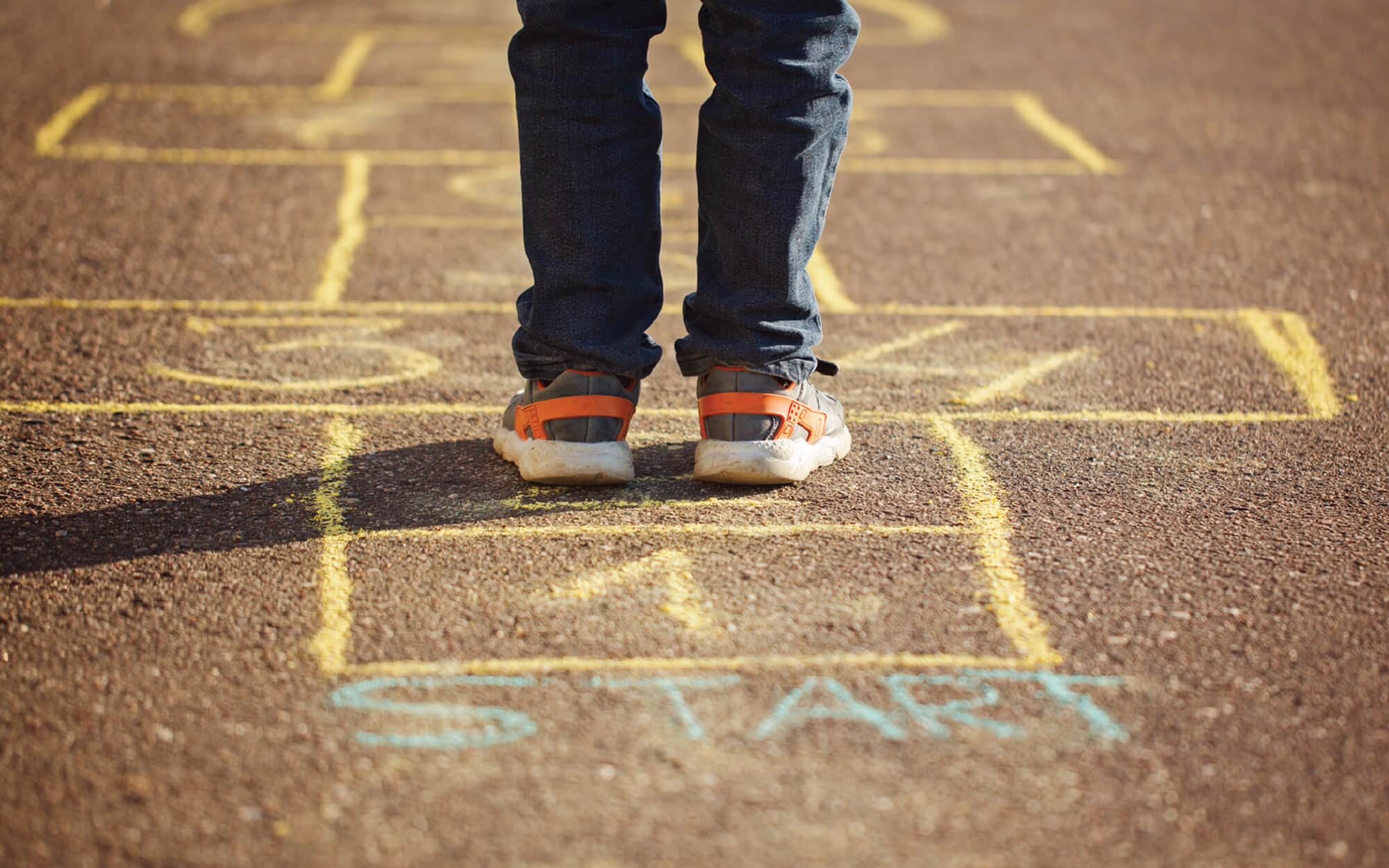 person playing hopscotch