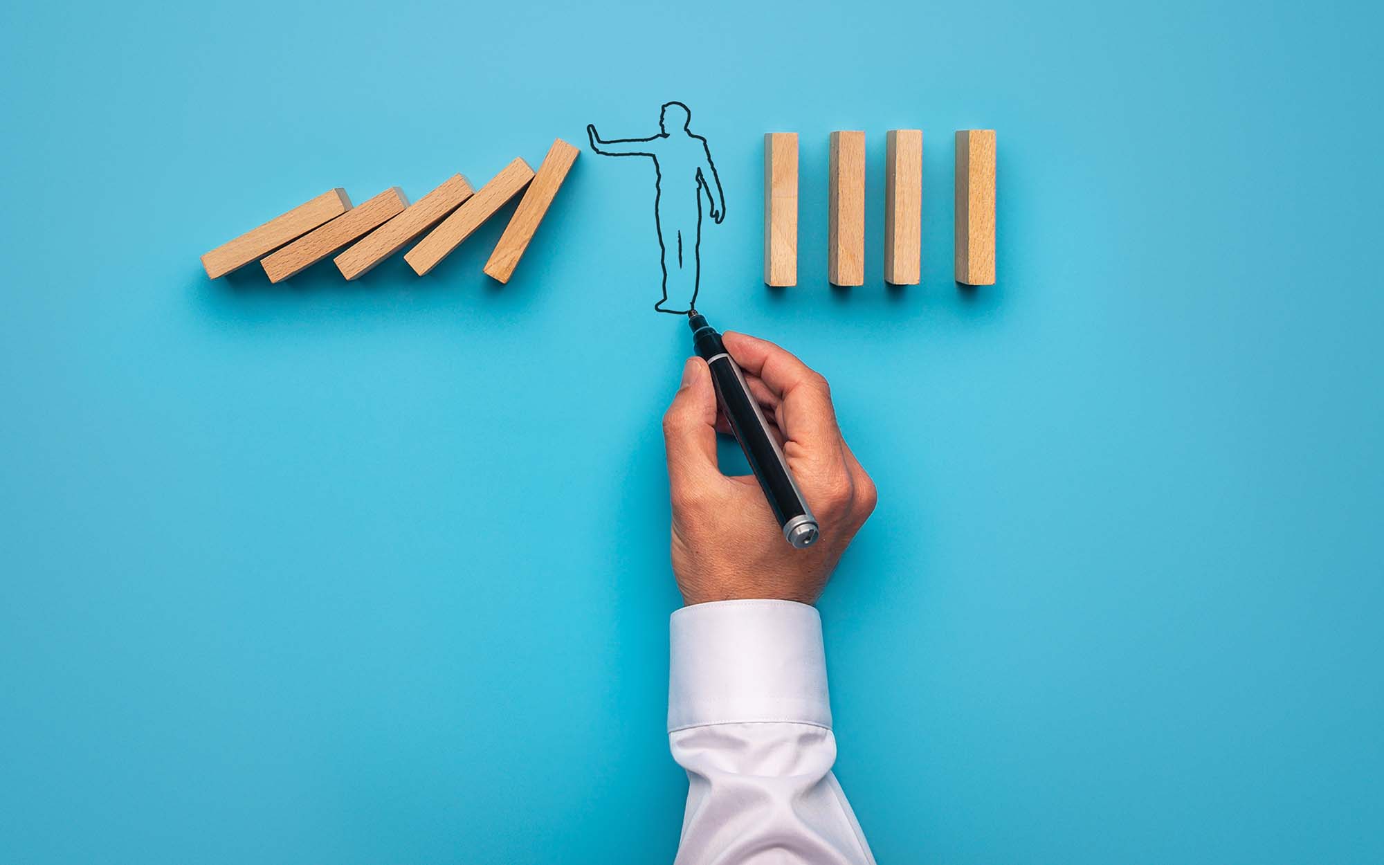 line drawing of person and wooden blocks