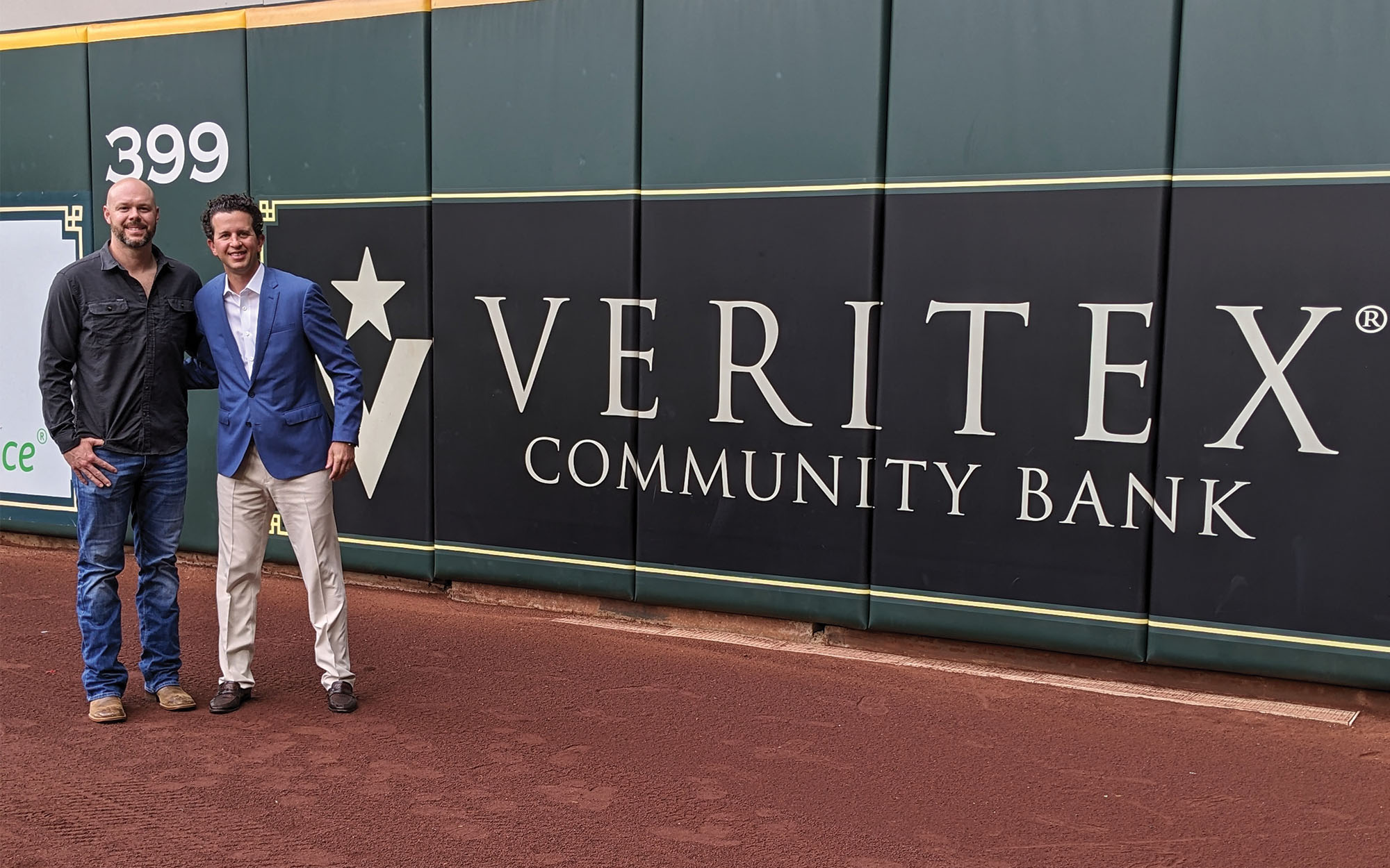 Houston Astros pitcher Ryan Pressly (left) and Veritex Bank’s Houston president, Jon Heine