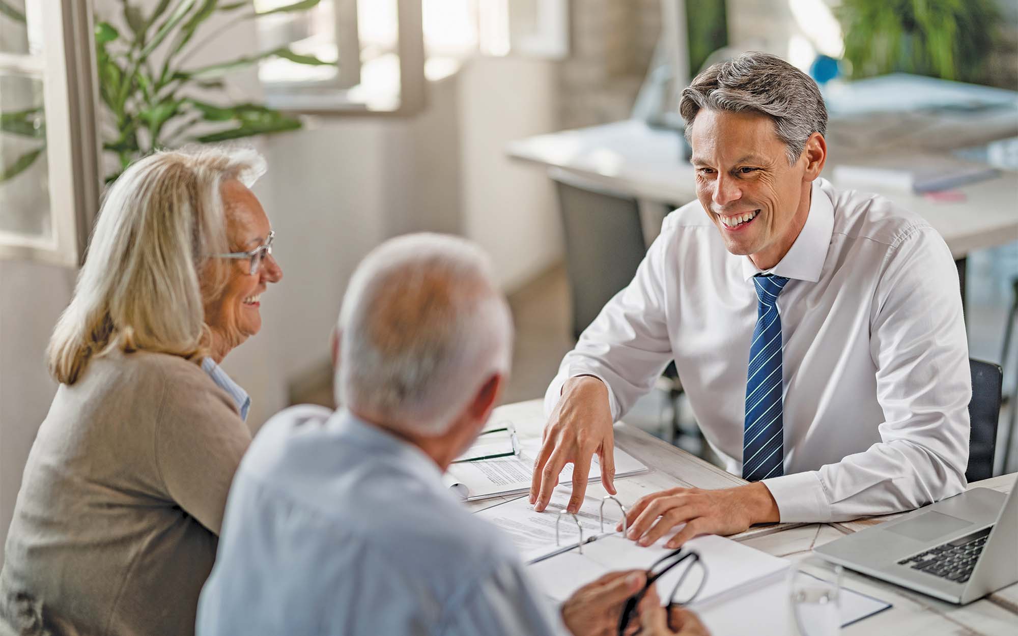 Man meeting with seniors