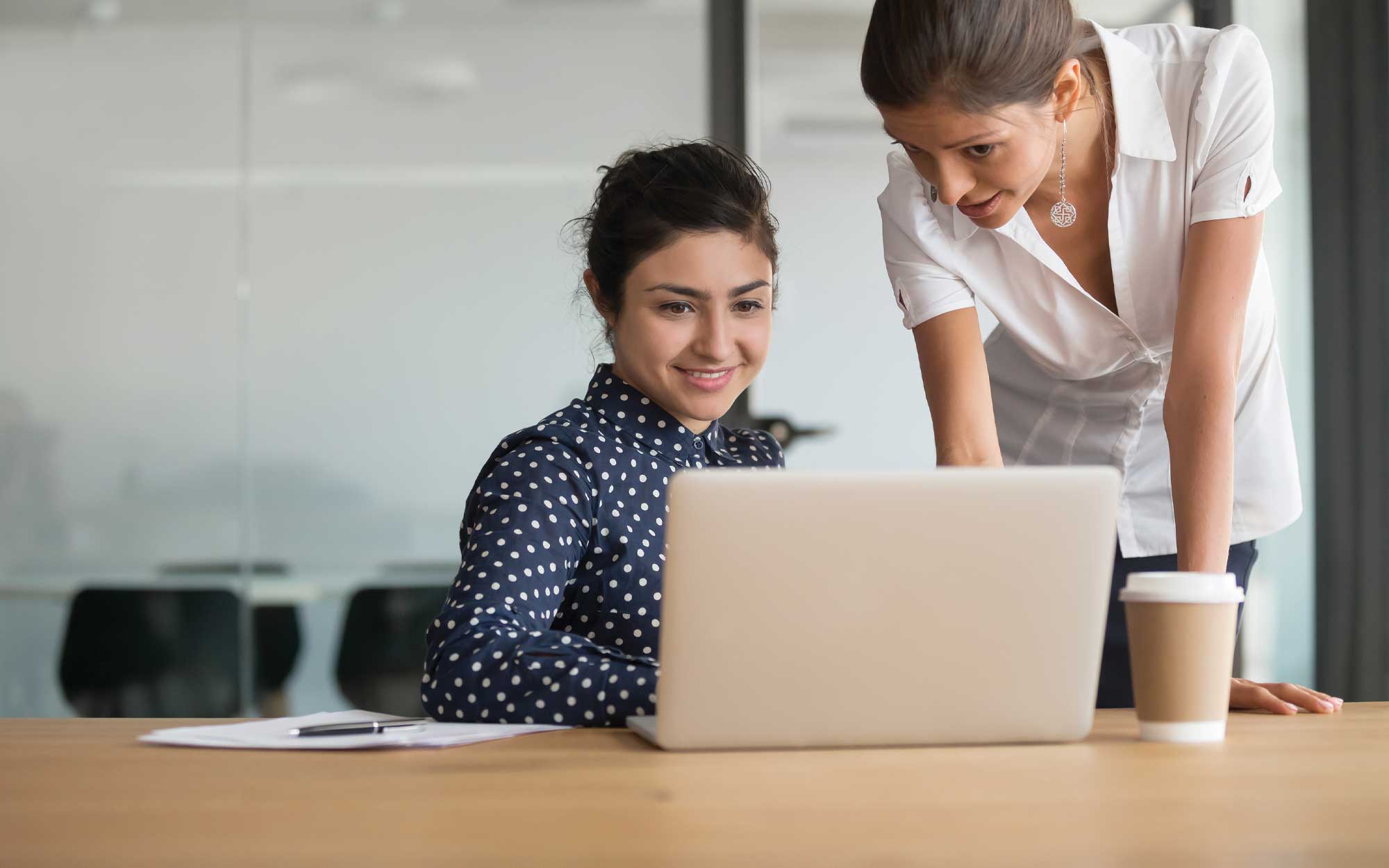 women looking at a computer