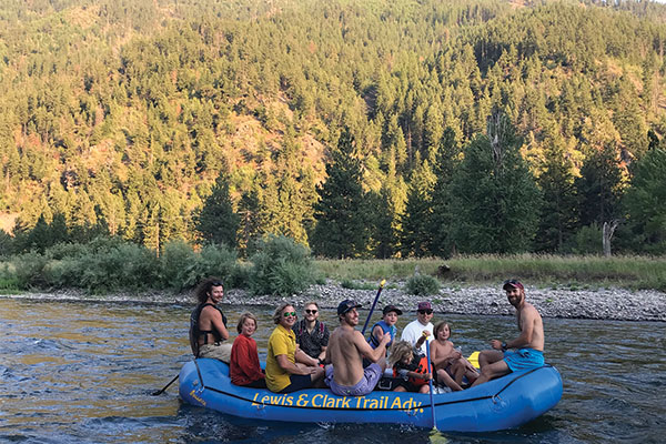 Bank of Montana team river rafting