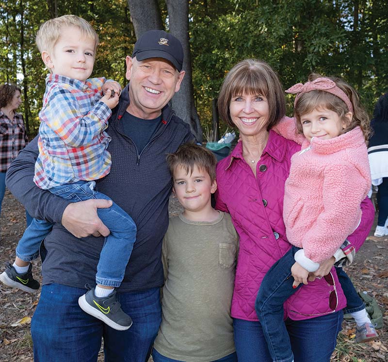 Terry Jorde with husband Mike and three grandchildren